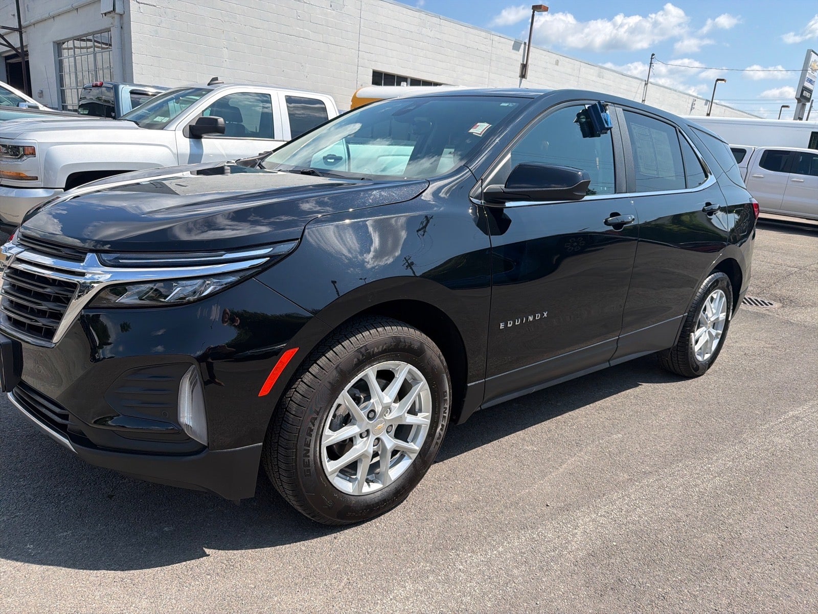 2024 Chevrolet Equinox LT in Mosaic Black Metallic — front three-quarter view